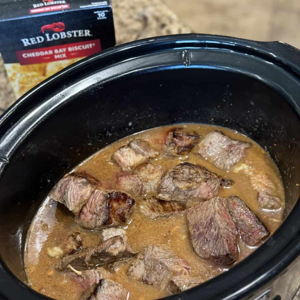 Roast in gravy in a crockpot.