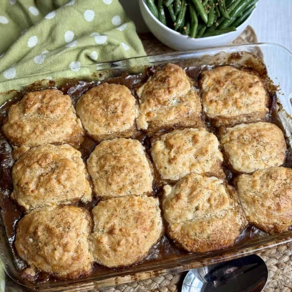 A baking dish of beef cobbler.