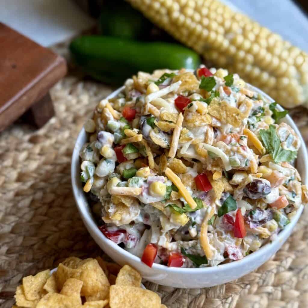 A bowl of corn chip salad.