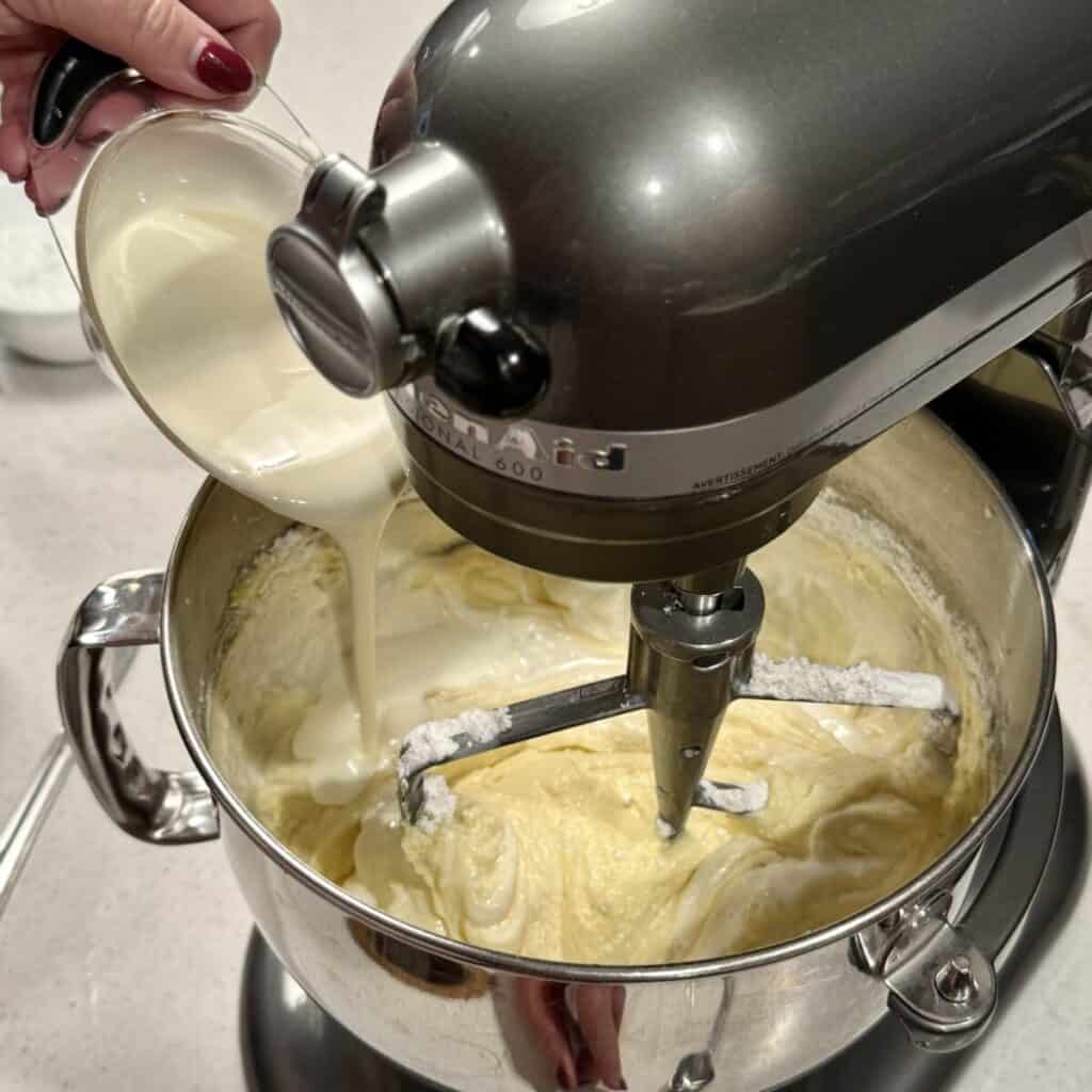 Mixing together almond pound cake batter.