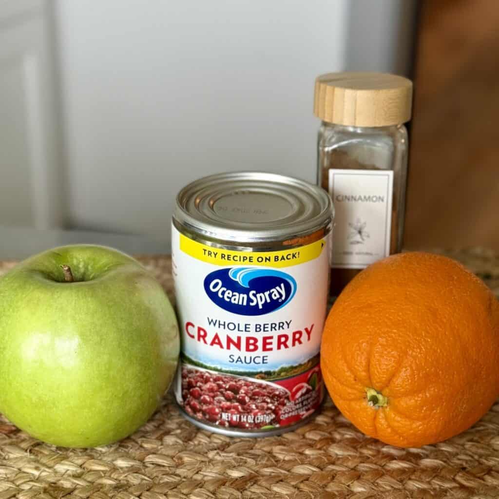 The ingredients to make homemade whole berry cranberry sauce.