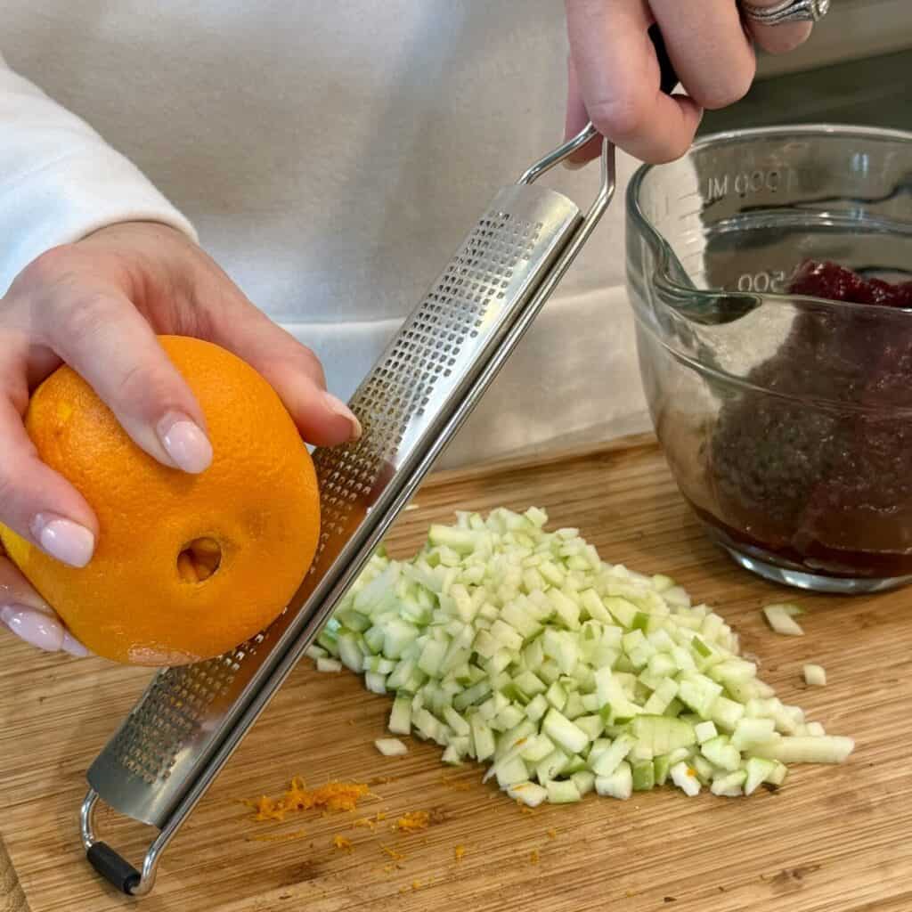 Zesting an orange.