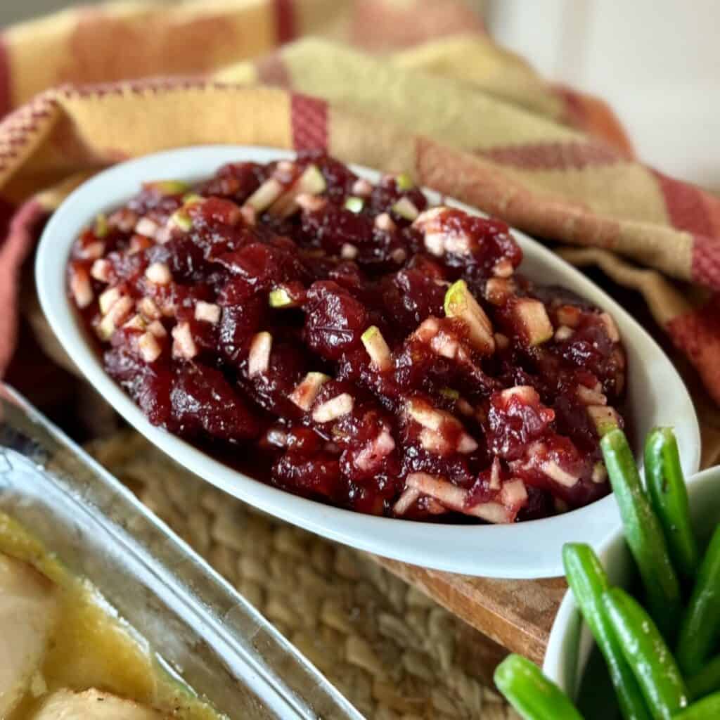 A bowl of homemade whole berry cranberry sauce.