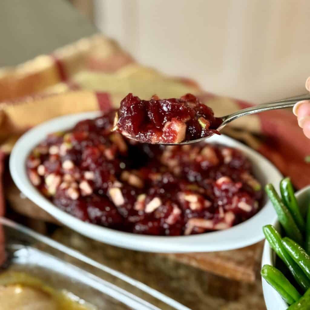 A bowl of homemade whole berry cranberry sauce.