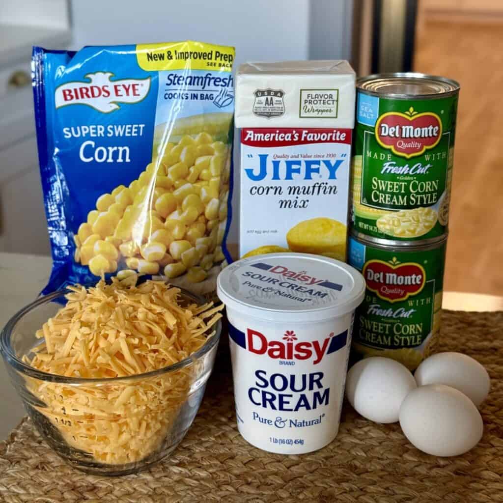 The ingredients to make cheesy corn casserole.