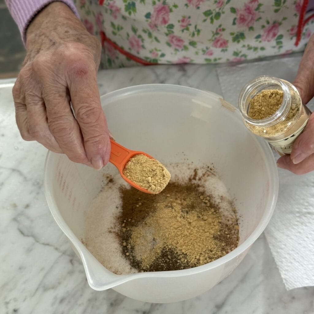 Whisking together the filling for cushaw pie.