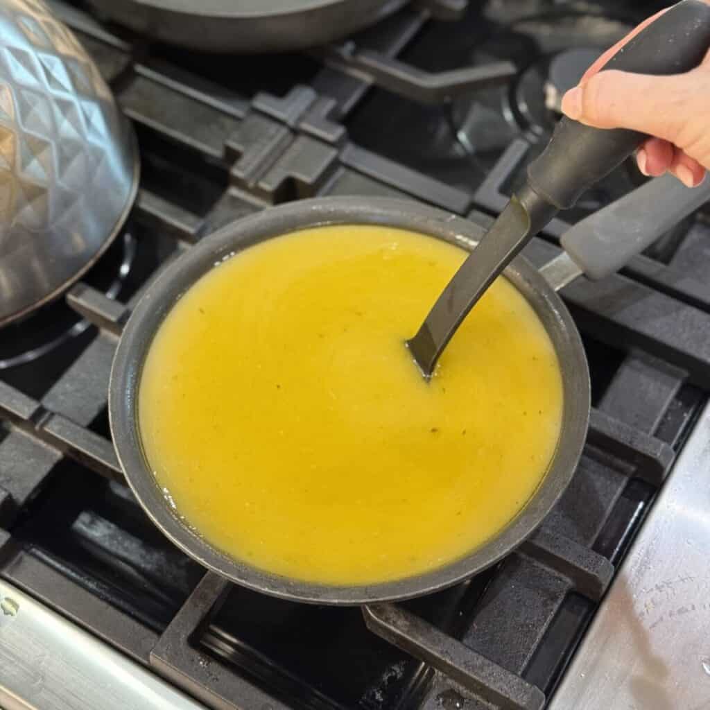 Making gravy in a skillet. 