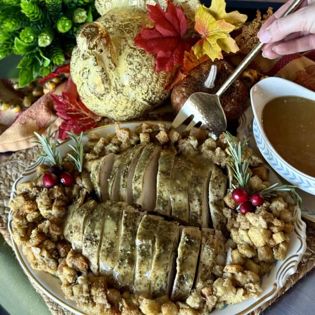 Serving turkey breast on a platter.