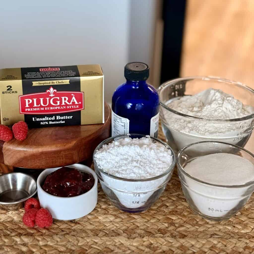 The ingredients to make raspberry thumbprint cookies.