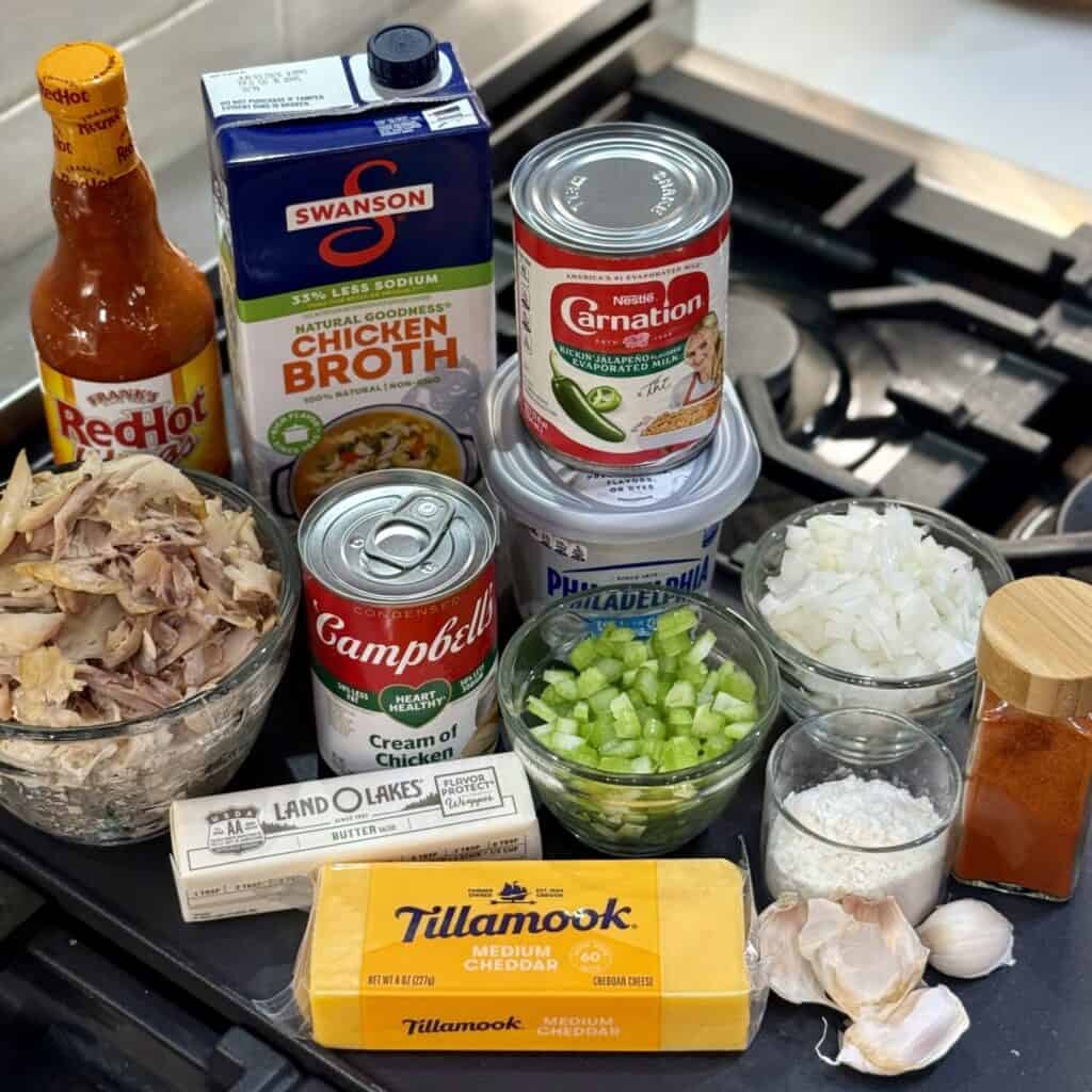 The ingredients displayed to make buffalo chicken soup.