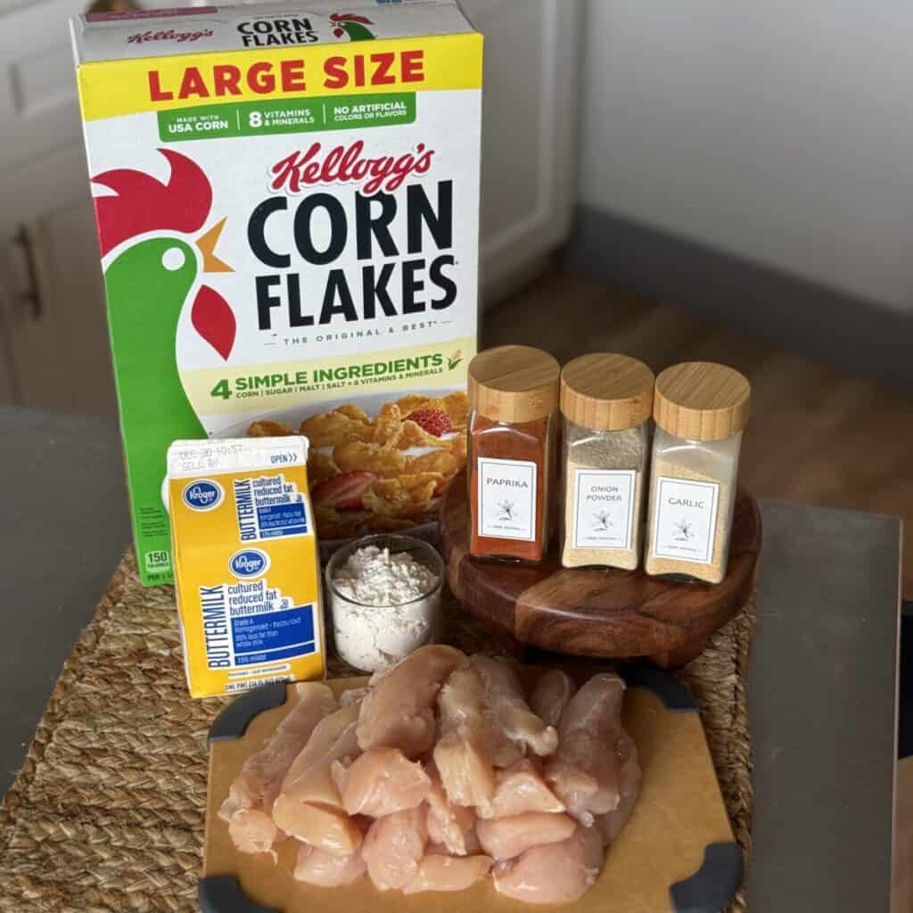 The ingredients to make cornflake chicken tenders.