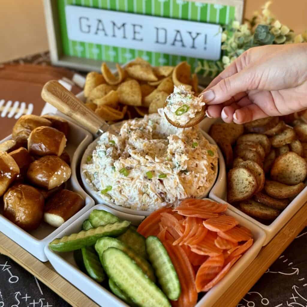 A bowl of million dollar dip and dippers for it.