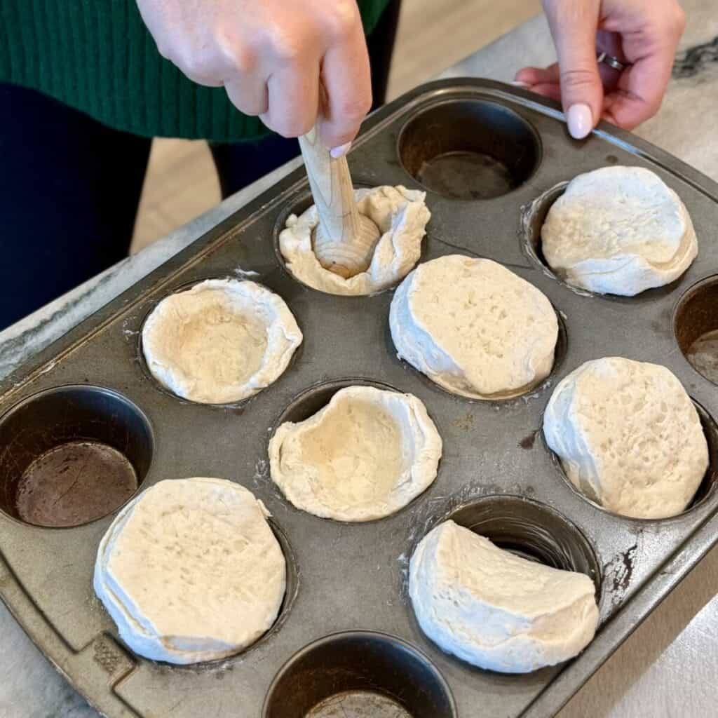 Making the crust for mini pot pies.
