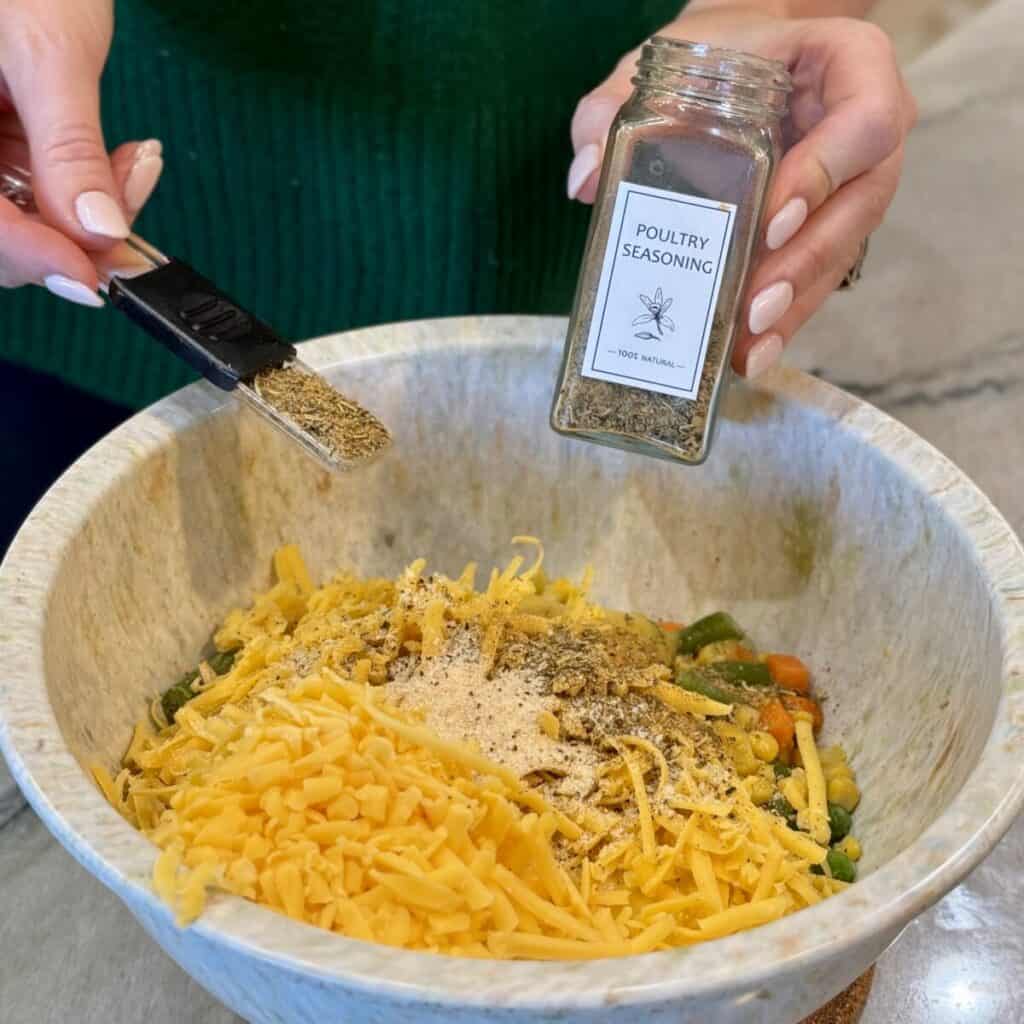 Making the filling for mini chicken pot pie.