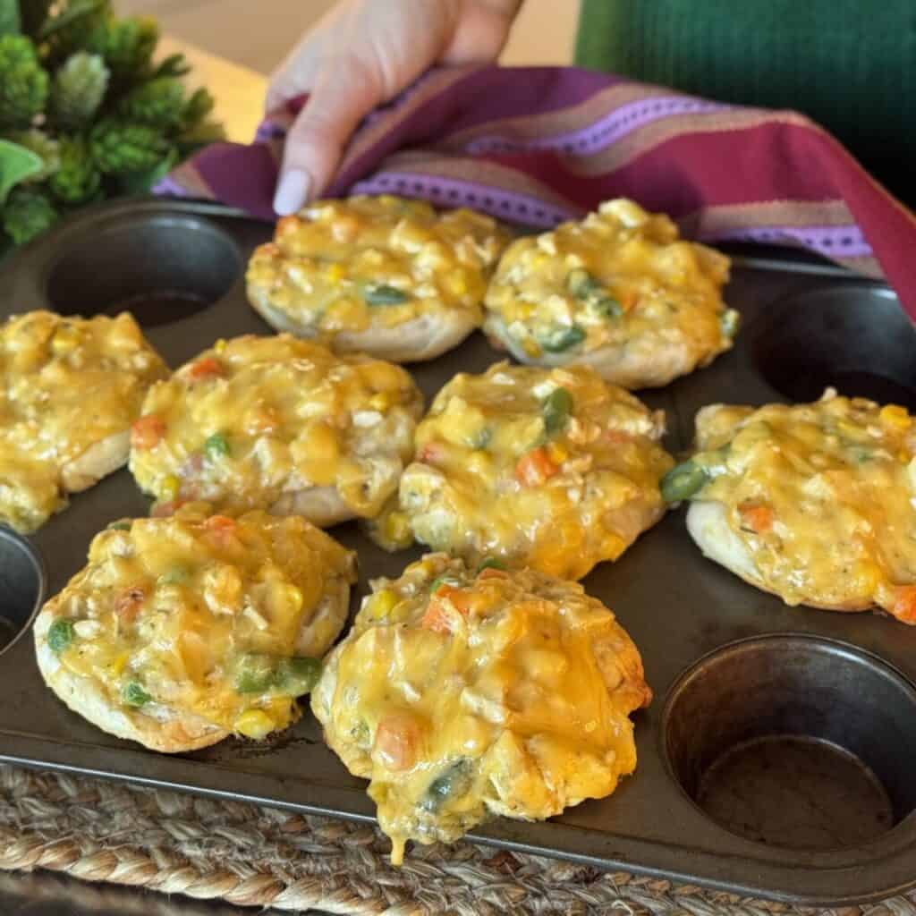 A pan of mini chicken pot pies.