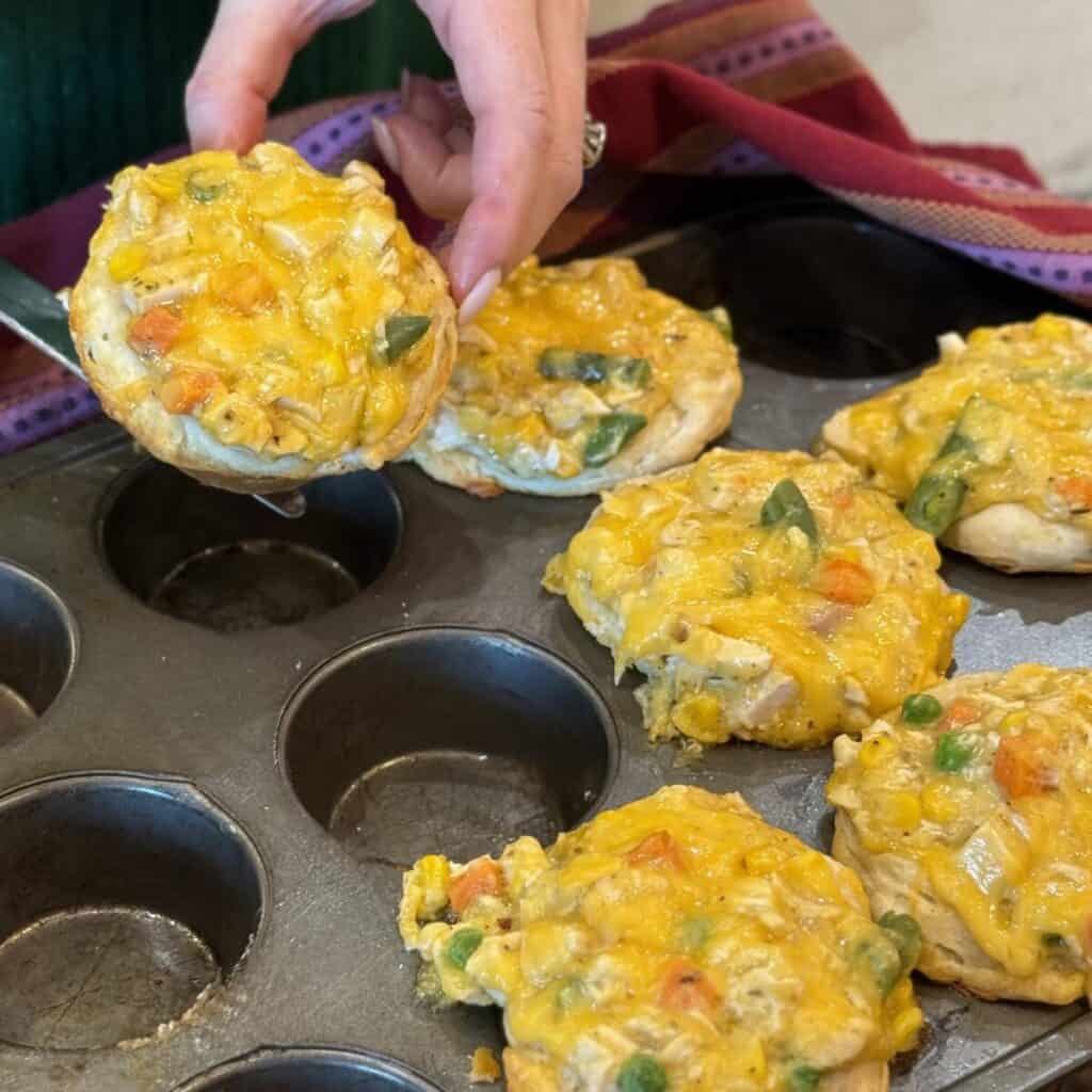 A pan of mini chicken pot pies.