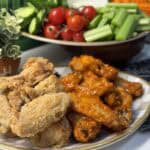 A plate of crispy baked chicken wings.