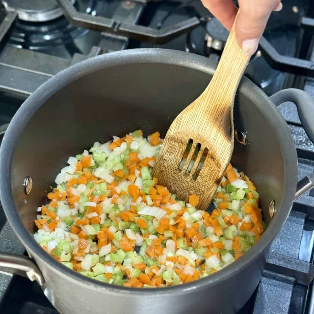 A pan vegetables for chick-fil-a chicken noodle soup.