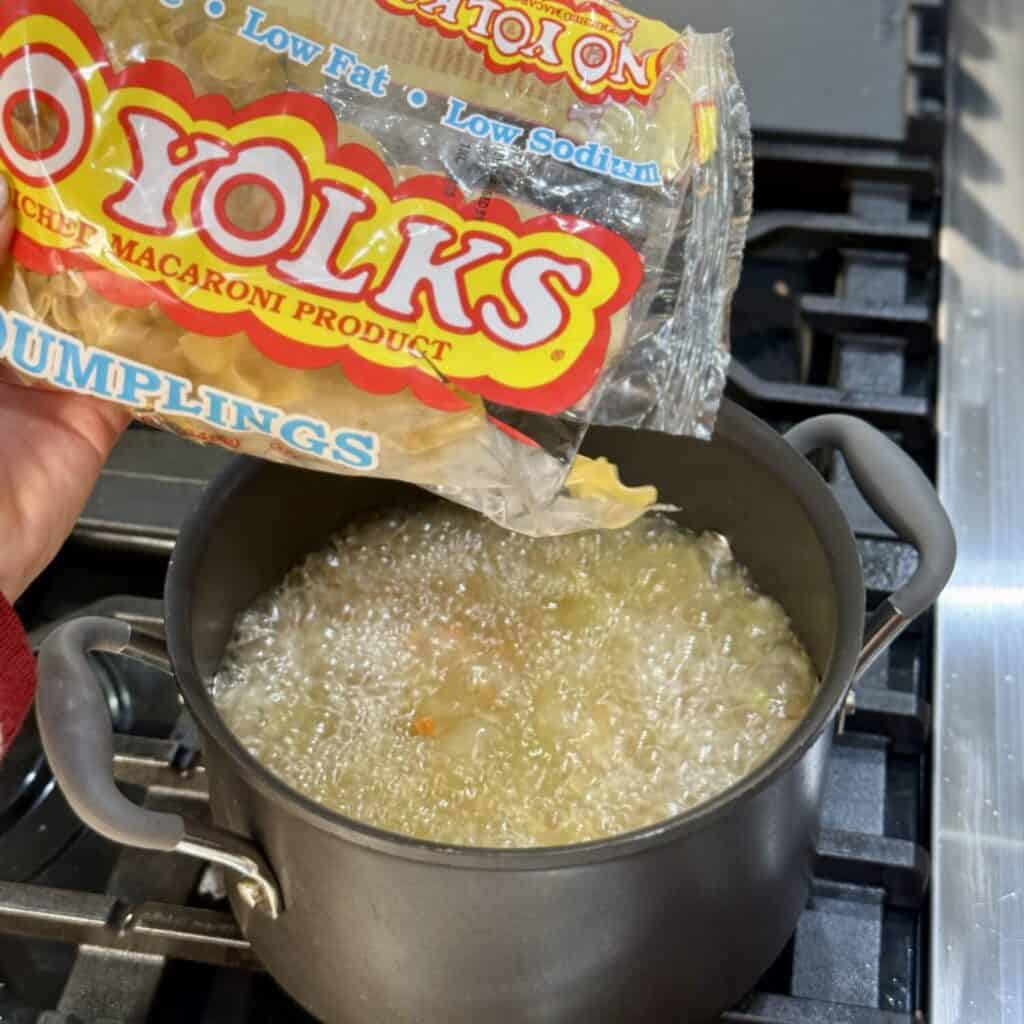 A pan of chick-fil-a chicken noodle soup.