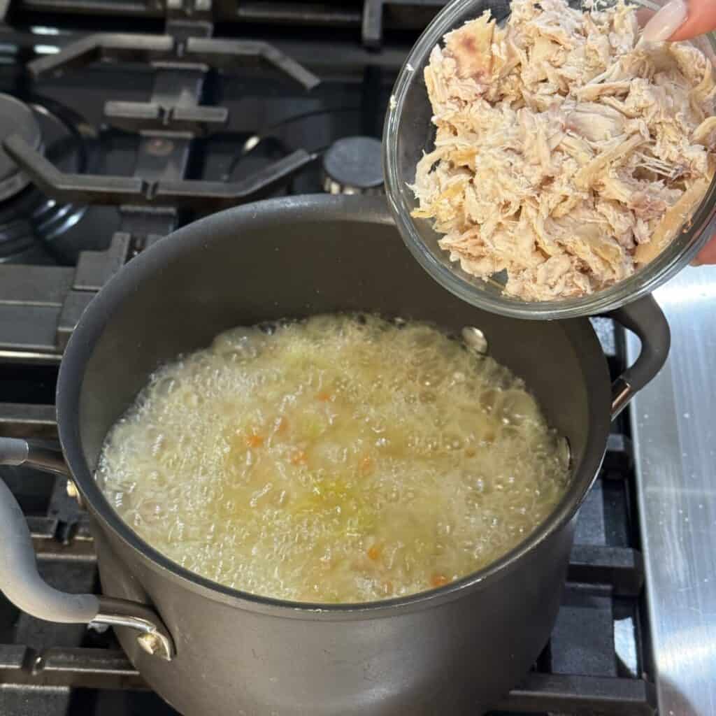 A pan of chick-fil-a chicken noodle soup.