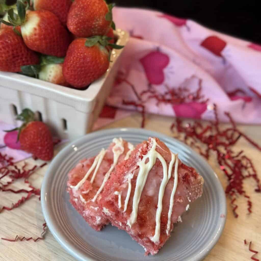A plate of strawberry brownies.