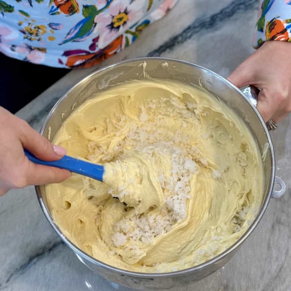 Mixing the batter for a coconut pound cake.