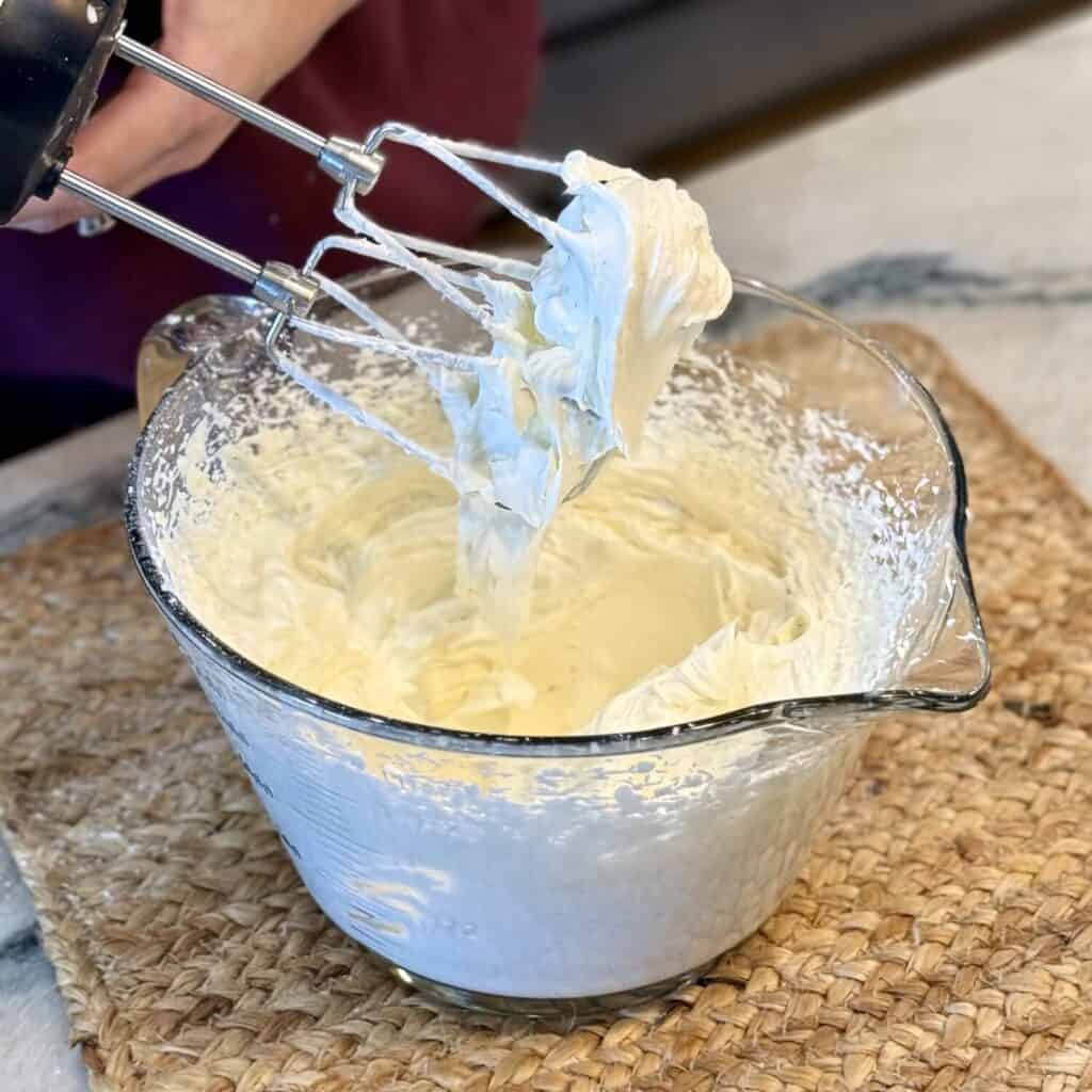 Making layers of Chessman Banana Pudding.