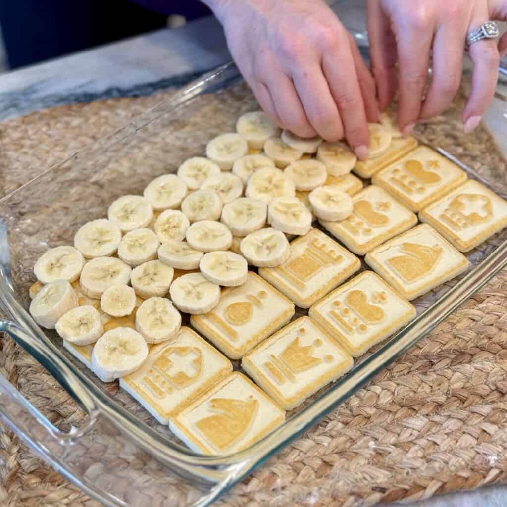 Making layers of Chessman Banana Pudding.