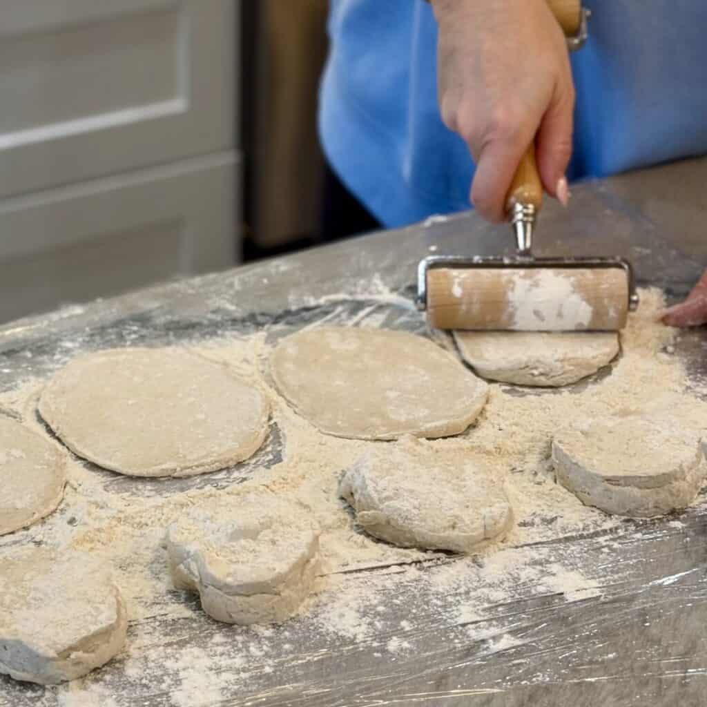 Rolling dough for Chicken and Dumplings with Canned Biscuits..