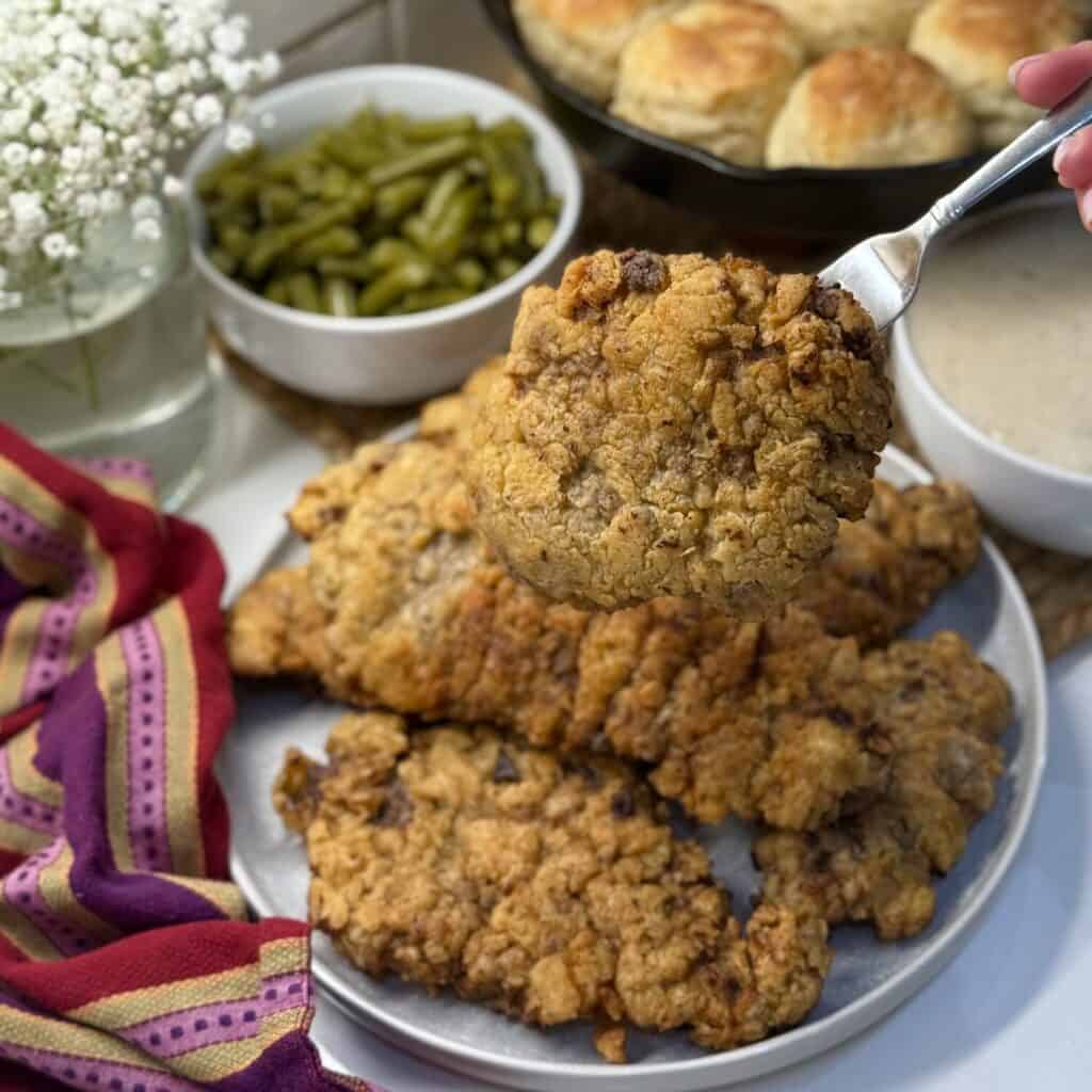 A plate of chicken fried steak.