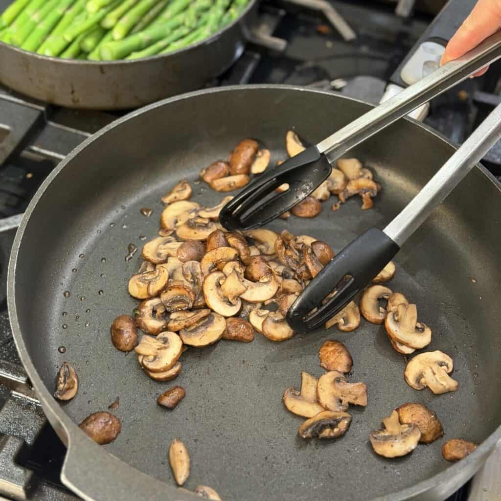 Cooking mushrooms.