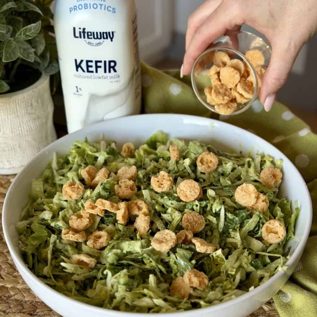A bowl of green goddess salad.