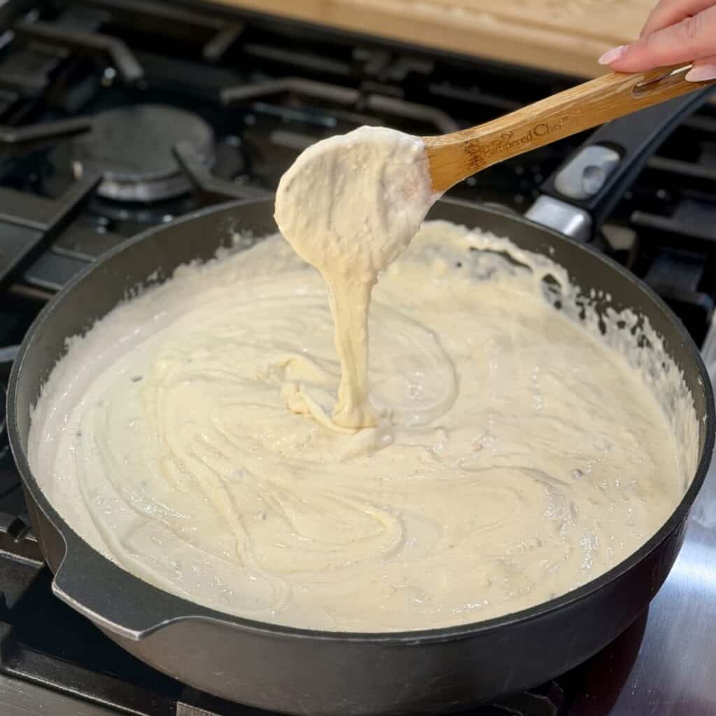 Mixing the Mac and Cheese sauce.