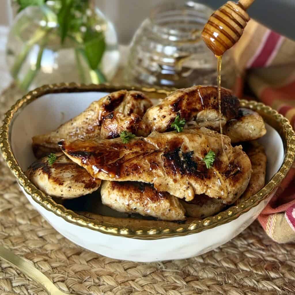 Chicken tenders in a bowl.