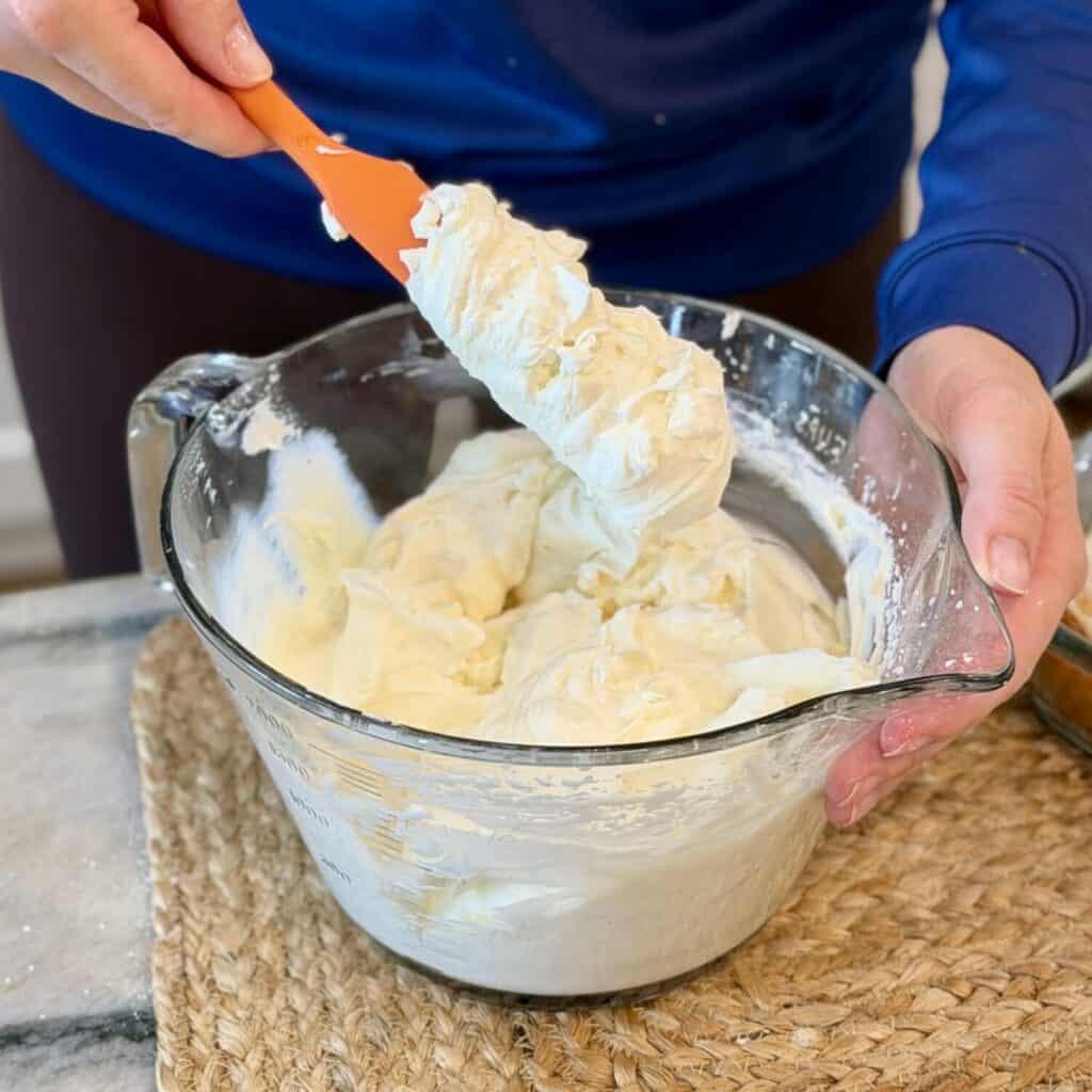 Folding the cream together.