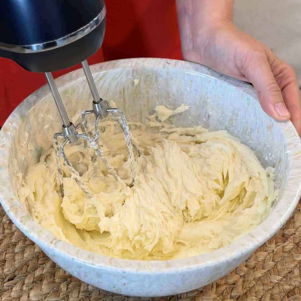 Whipping the cream together.