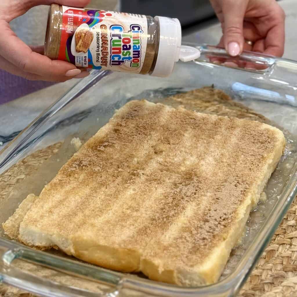 Adding cinnamon powder to the sliders.