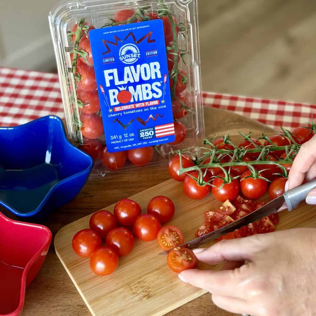 Cutting cherry tomatoes.