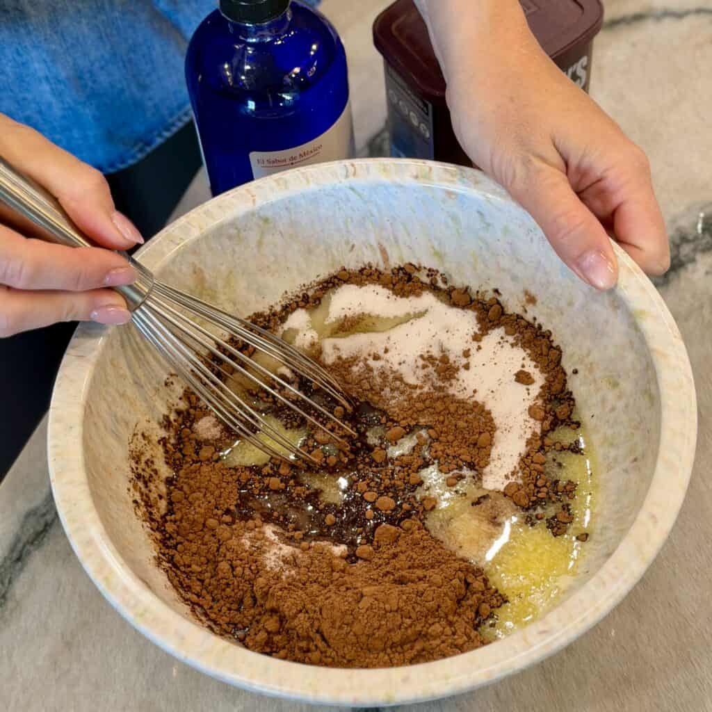 Mixing all the ingredients together.