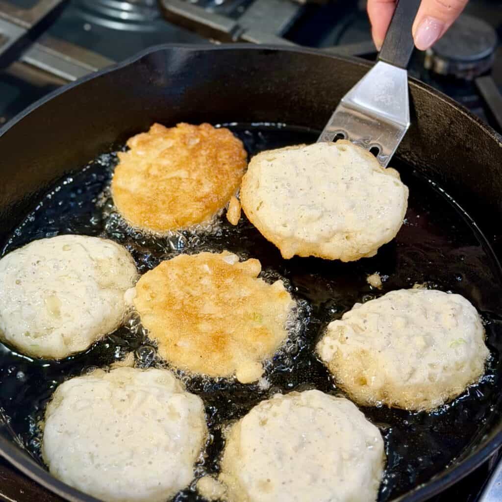 Flipping the onion Pattie.