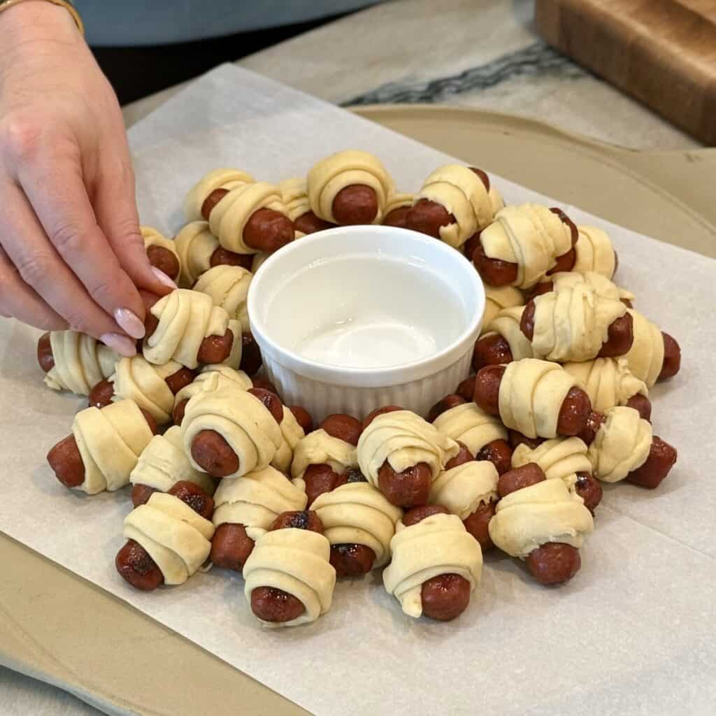 Stacking the pigs in a blanket together.