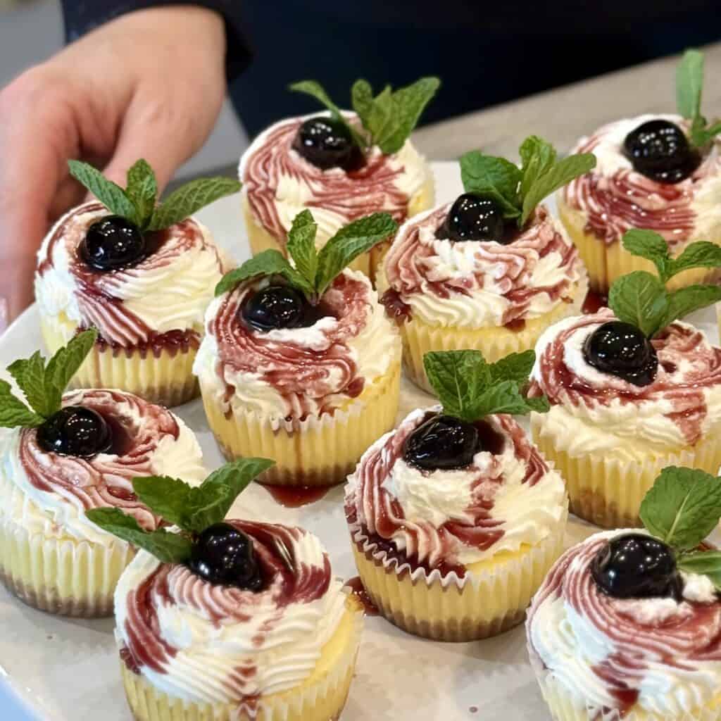 A plate of Mini Cherry Cheesecakes.