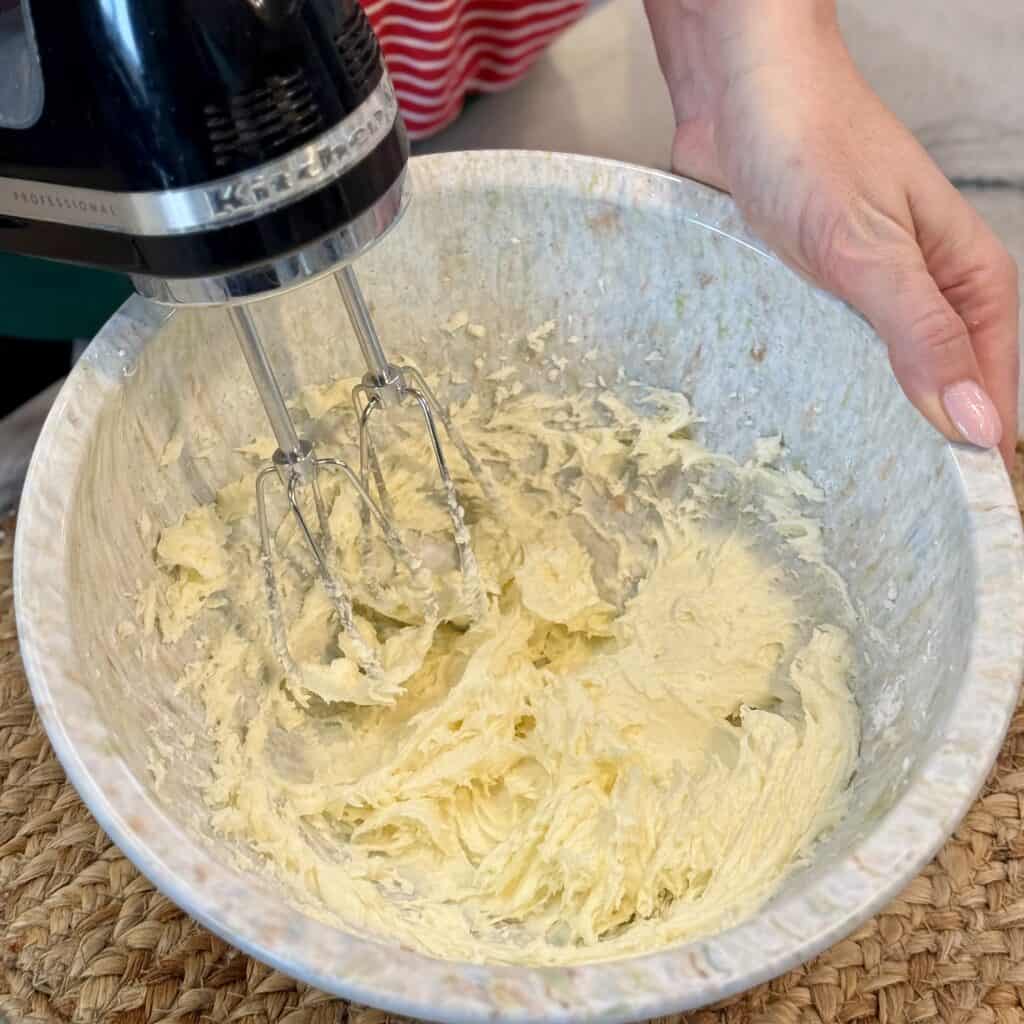 Whipping the cream together.