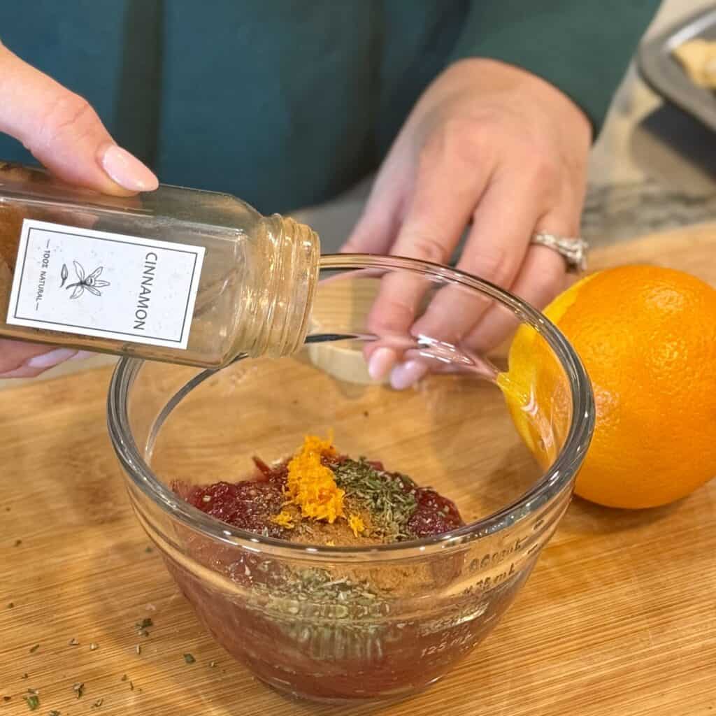 Adding seasonings to the bowl.