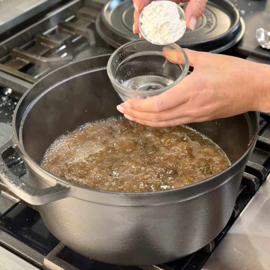 Adding flour to the pot.