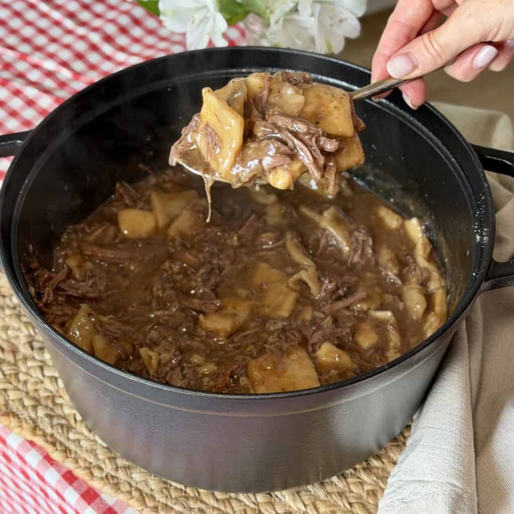 A pot of beef and dumplings.