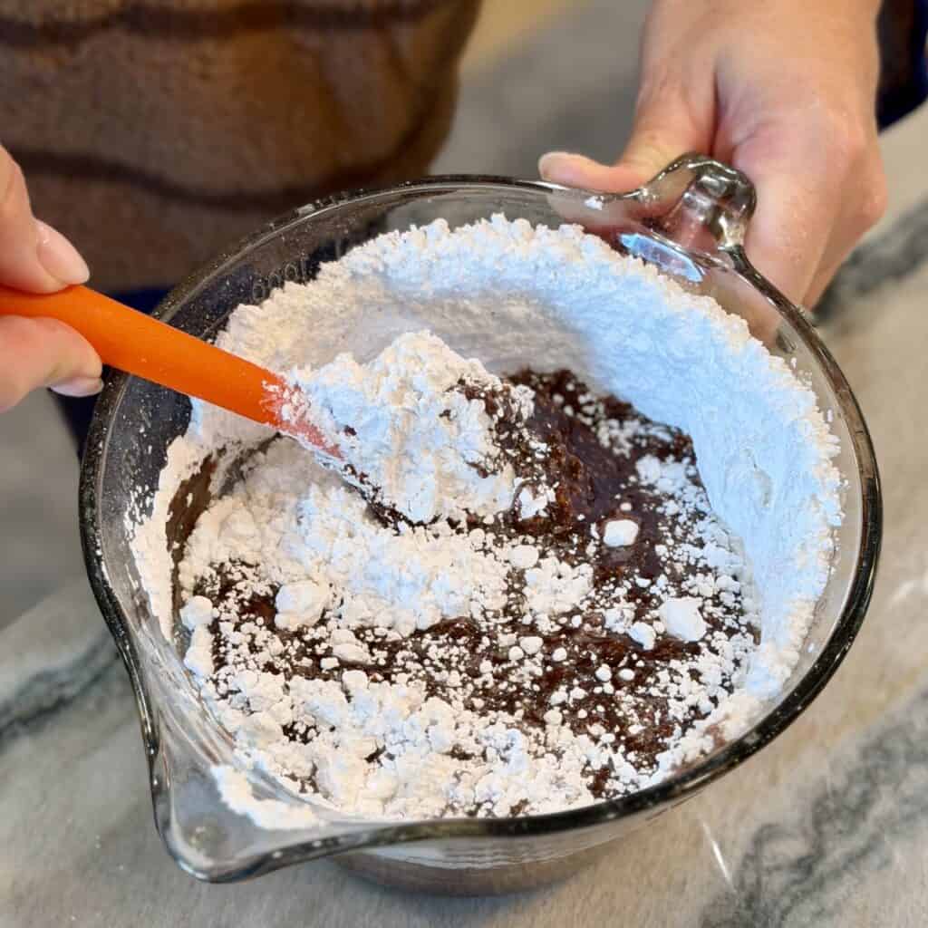 Mixing the icing for Texas Sheet Cake.